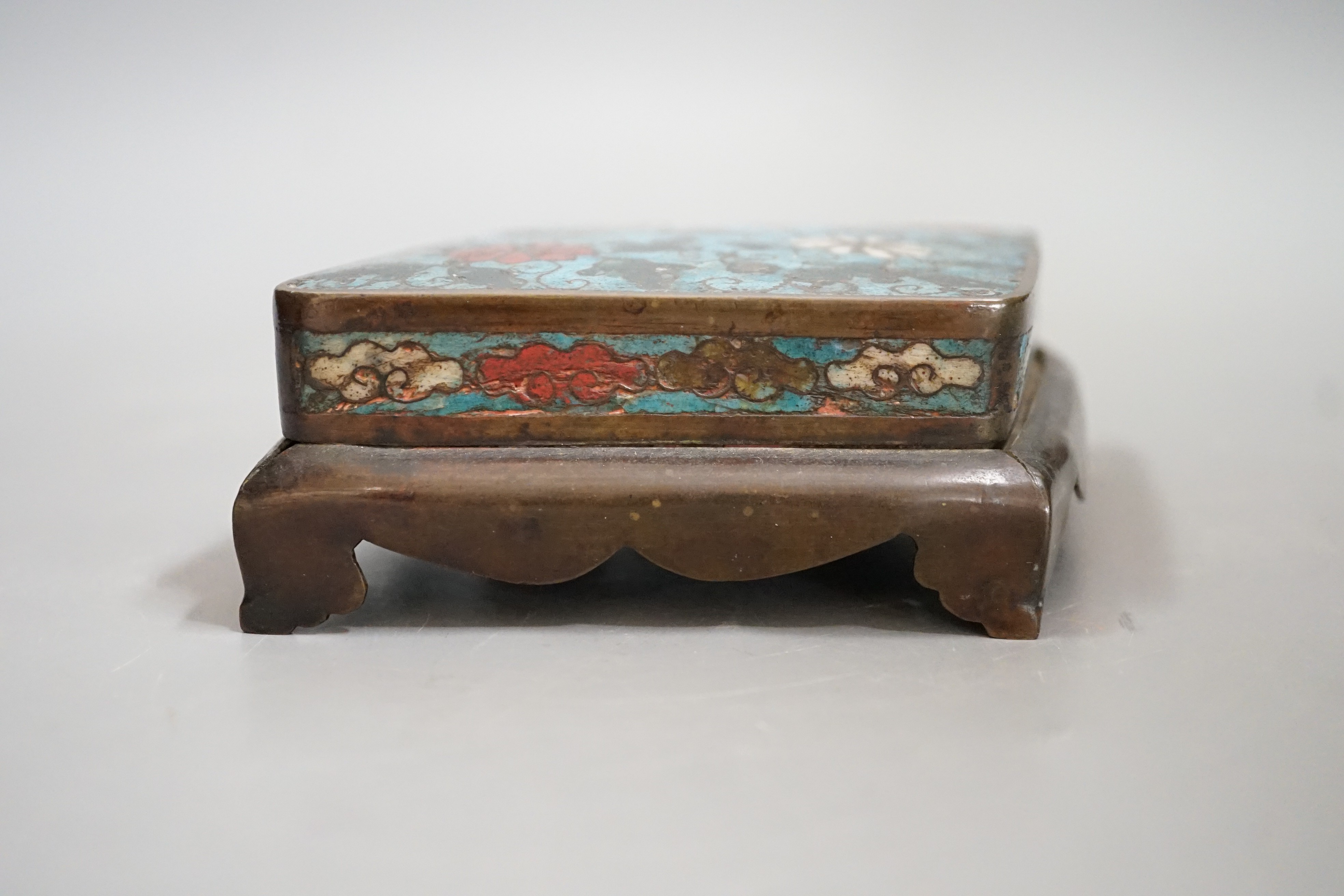 A Chinese Ming cloisonné enamel lozenge shaped stand, 15cms wide